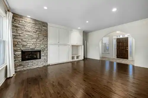 Hardwood floor refinishing project with dark stain in a Broomfield Colorado living room
